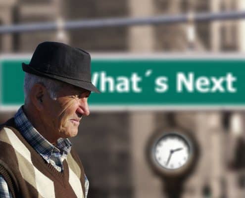 old man with signpost: What's next?
