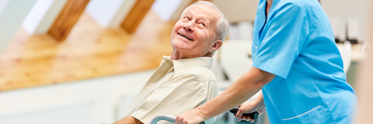 elderly carer caring for a stroke patient